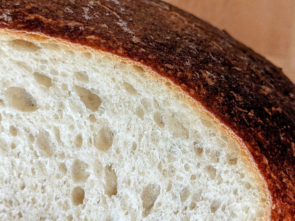 Close-up of sourdough texture from a Costco Kirkland bakery loaf.