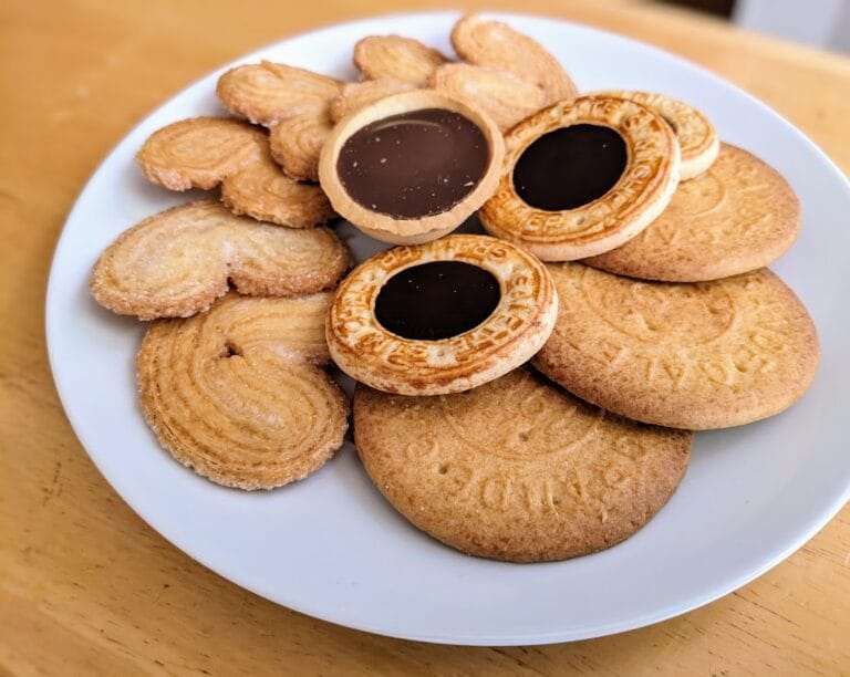 A white plate with an assortment of French Butter Cookies from St Michel.