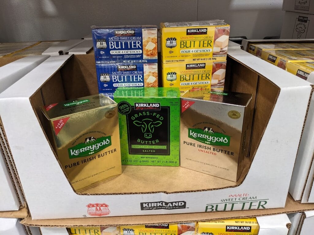 Five different types of butter from Costco, in a box inside the warehouse.