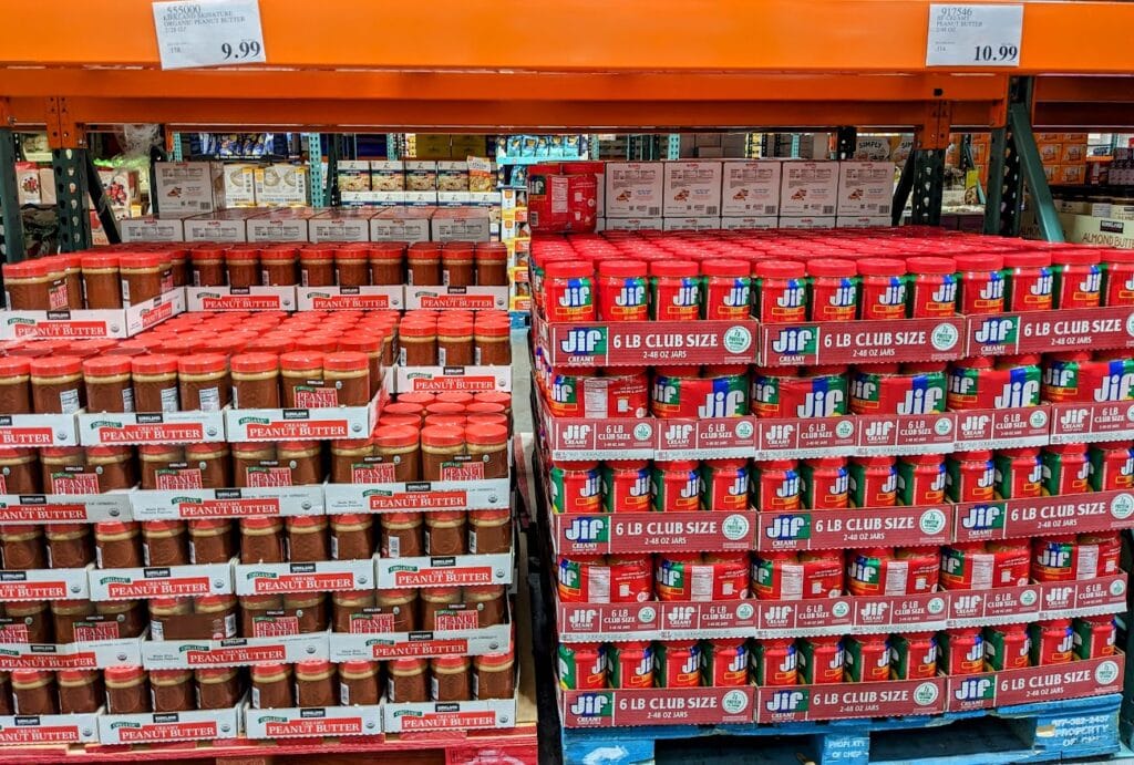 Peanut butter stacked inside a Costco warehouse.