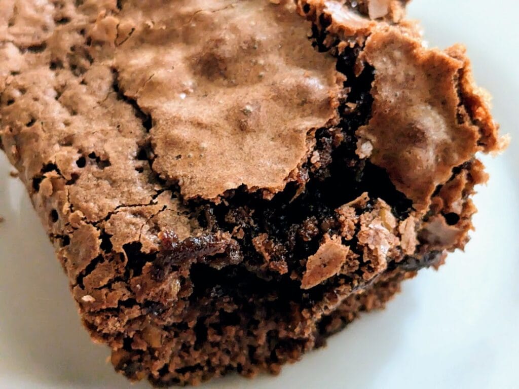 Crust on top of a brownie from Aldi's Chewy Fudge Mix.