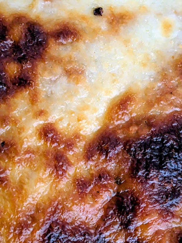 Detail of baked cheese texture from a Bremer frozen Lasagna from Aldi.