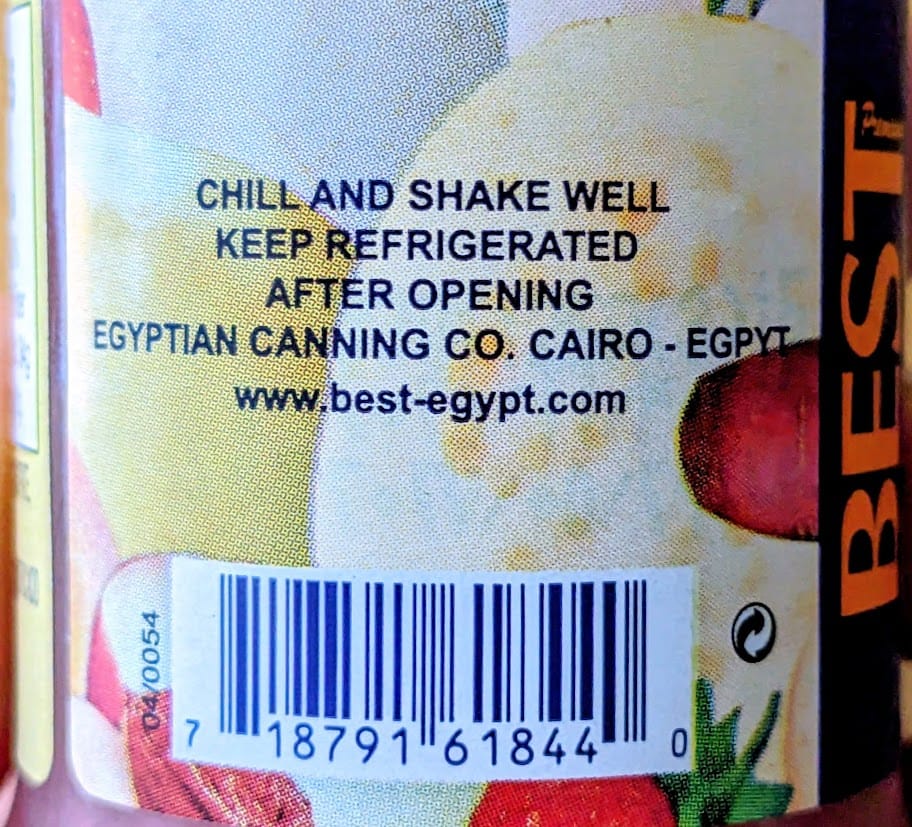 "Chill and Shake Well" instructions from a bottle of Fruit Juice Cocktail from BEST Egypt Canning Co.