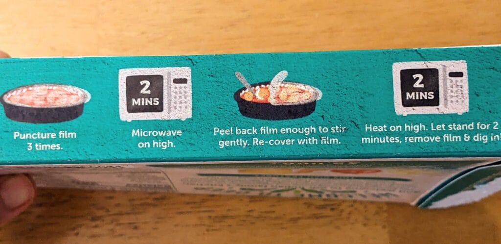 Microwave instructions on a box of frozen Deep Indian Paneer Tikka Masala.