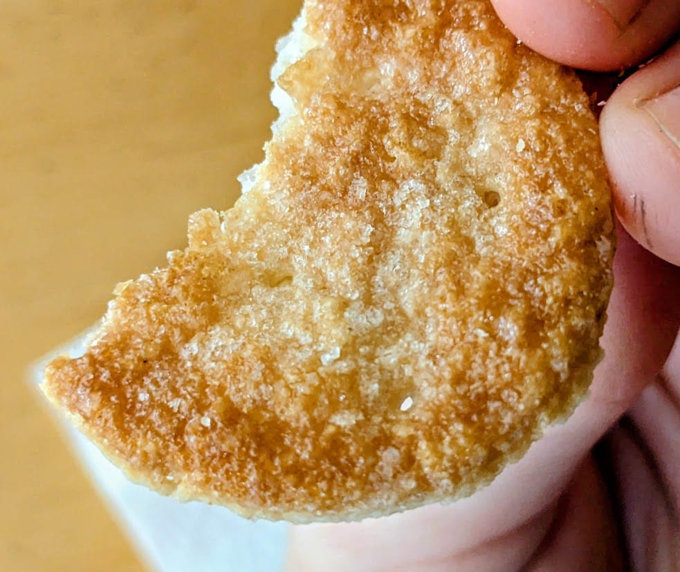 Textured sugar crust on the outside of a Karens Bakery Danish Puff Pastry Cookie from Costco.
