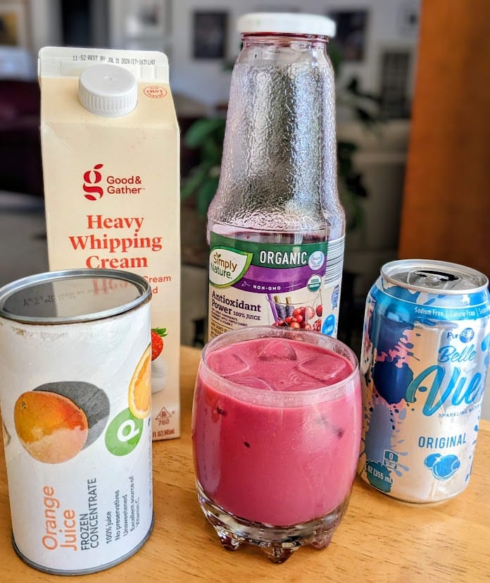 A cream soda with ingredients used: frozen orange juice concentrate, sparkling water, heavy whipping cream, and Aldi Simply Nature Antioxidant Power Organic Juice.