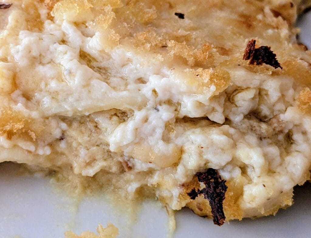 Detail of sauce inside a serving of Chicken Carbonara Lasagna from Rana.