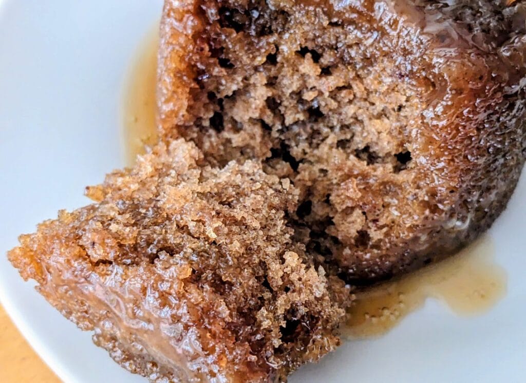 Close up of texture inside a British Sticky Toffee Pudding Co. single serve dessert from Costco.