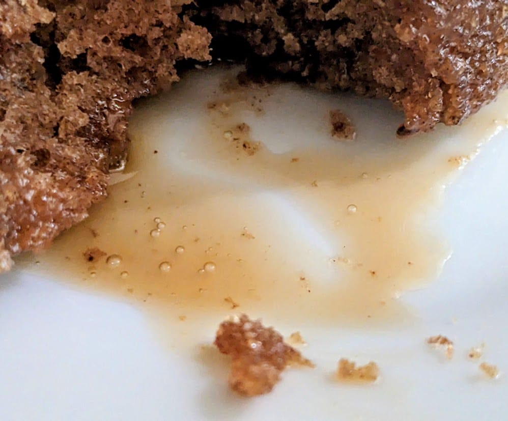 Close up of sauce from The Sticky Toffee Pudding Company single serve cake from Costco.