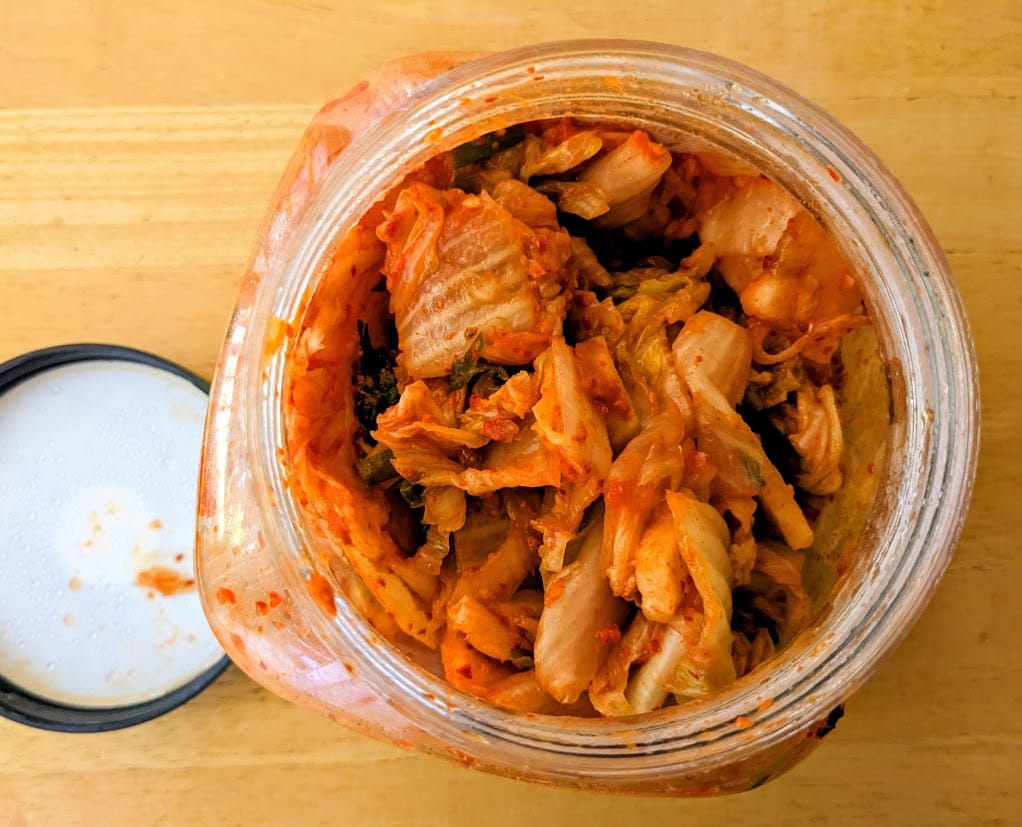 An open jar of Korean Kimchi from Jongga.