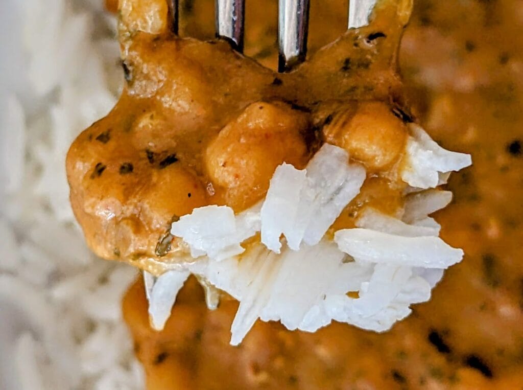 A fork with a bite of rice and Everyday Dal from Maya Kaimal.