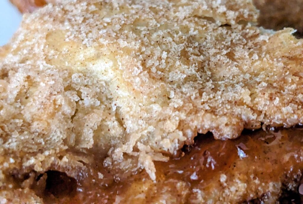 Cinnamon sugar crust on top of an Apple Flip pastry from the Publix Bakery.