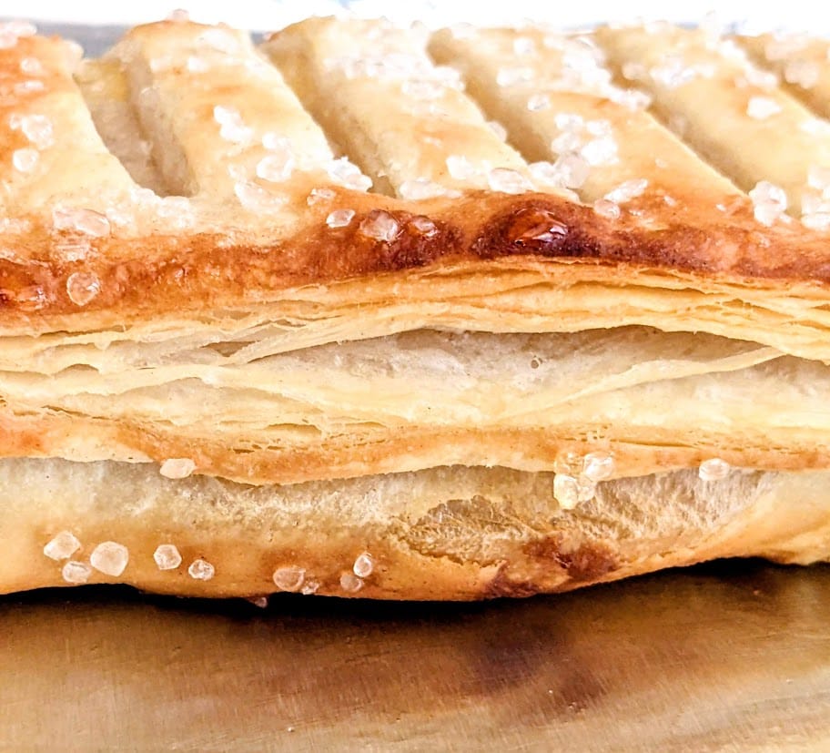Pastry layers from a side view of an Aldi Lemon Mascarpone Strudel.