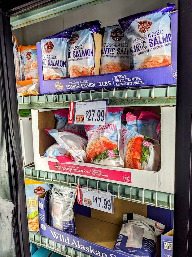A shelf of frozen bags of fish inside a BJ's Wholesale Club.