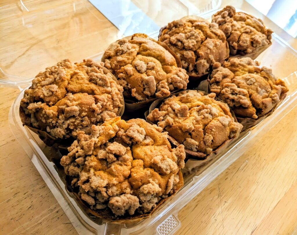 An open box of Costco's Pumpkin Streusel Muffins.